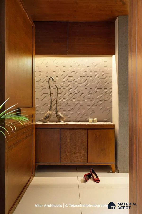 A bathroom with a wooden chair and radiator on the wall next to it in front of a wooden shelf filled with a wooden cabinet and white counter top of a vase filled with plants on the wall next